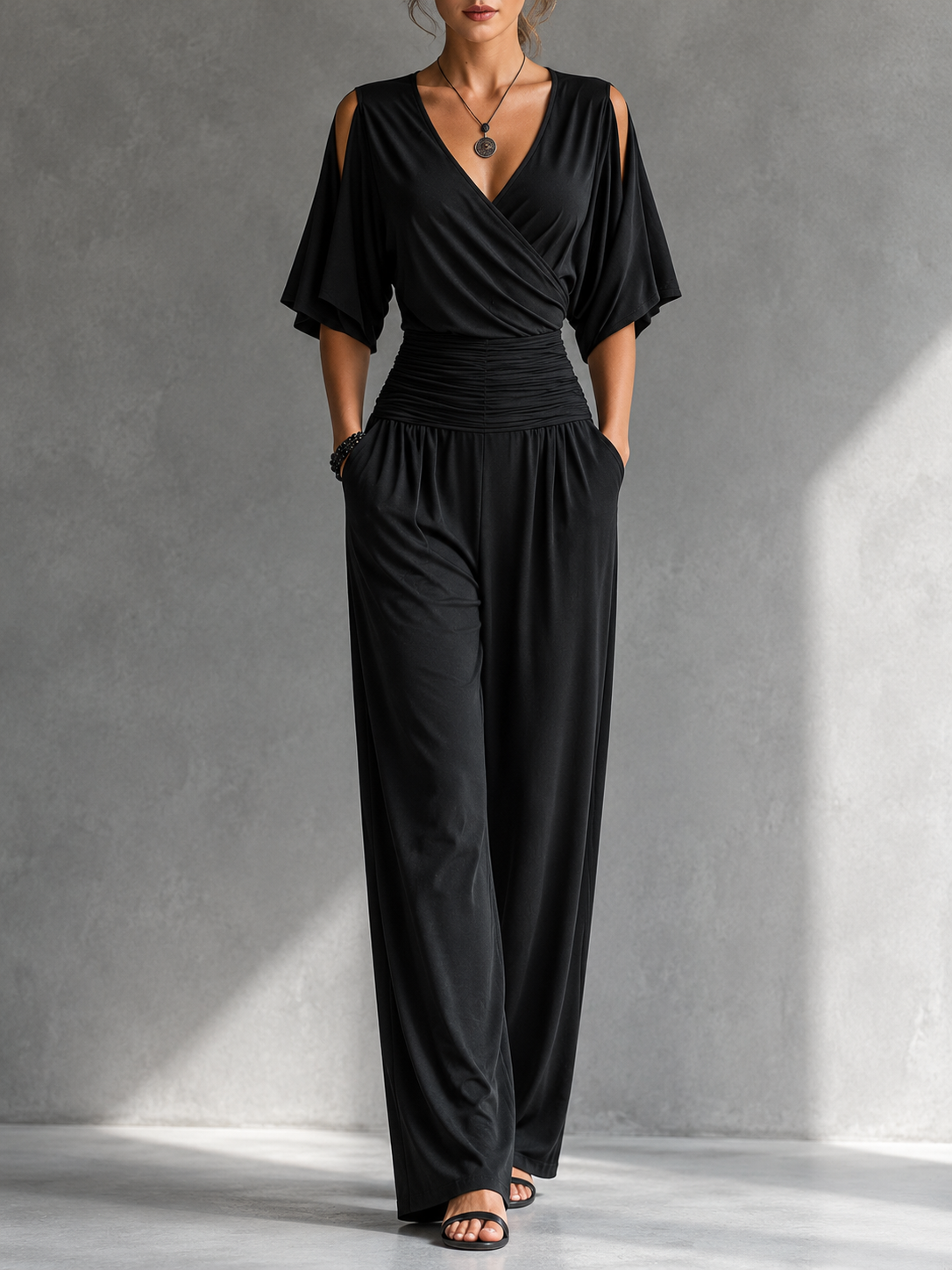 Conjunto elegante con efecto cruzado y pantalón ancho