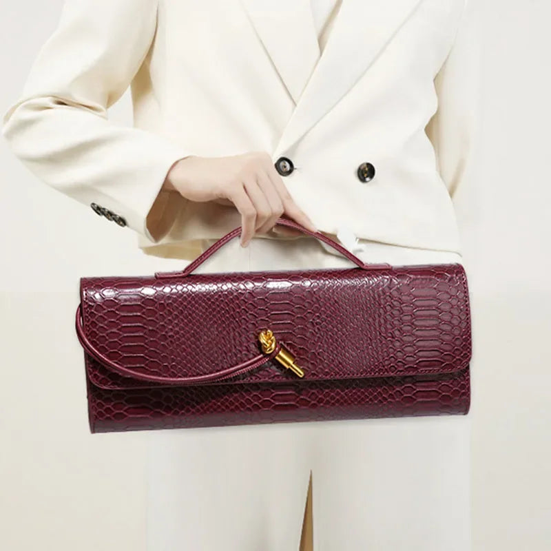Bolso de mano Sammi con estampado de serpiente